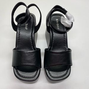 Bamboo black strap up wedged heels